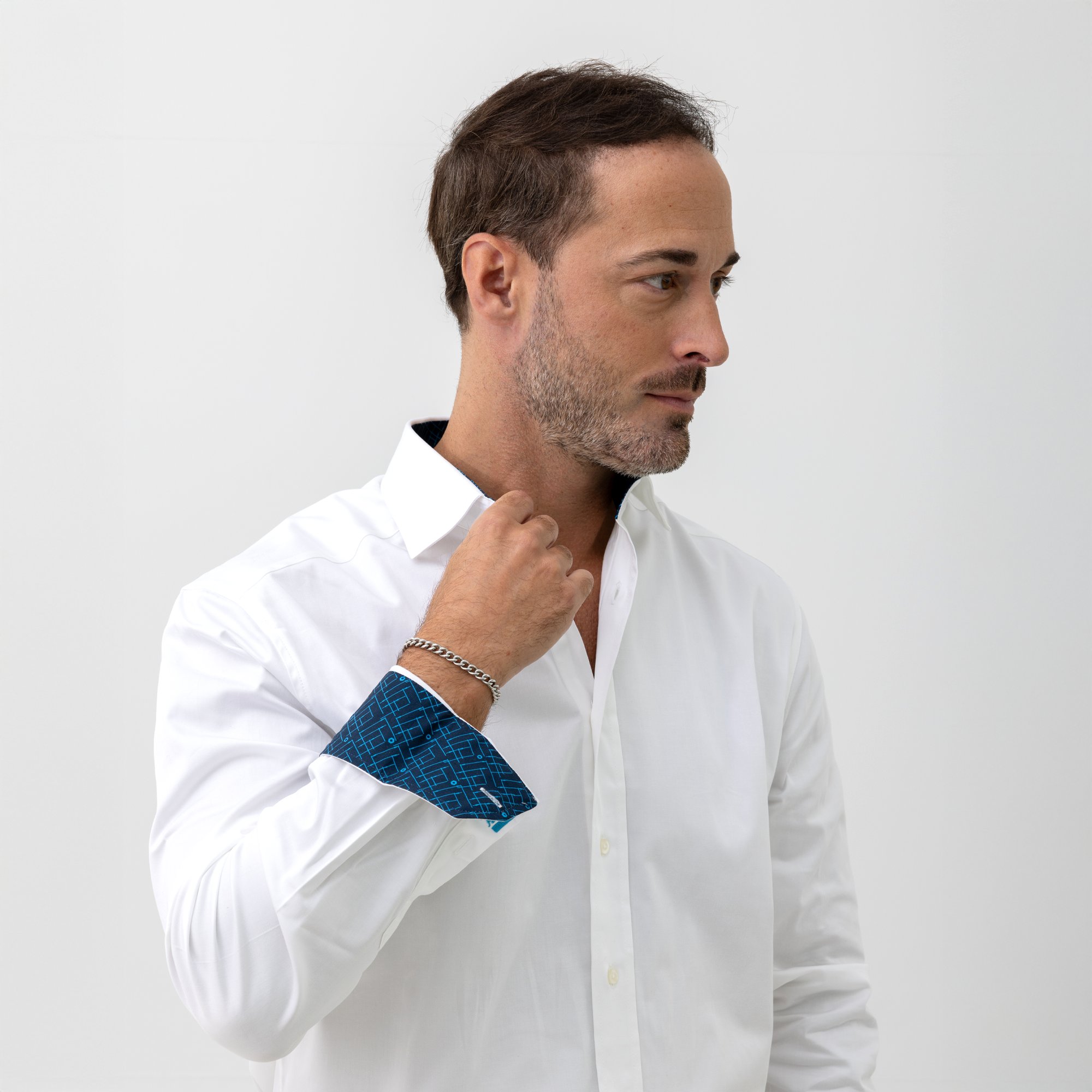 white business shirt with logo on sleeves