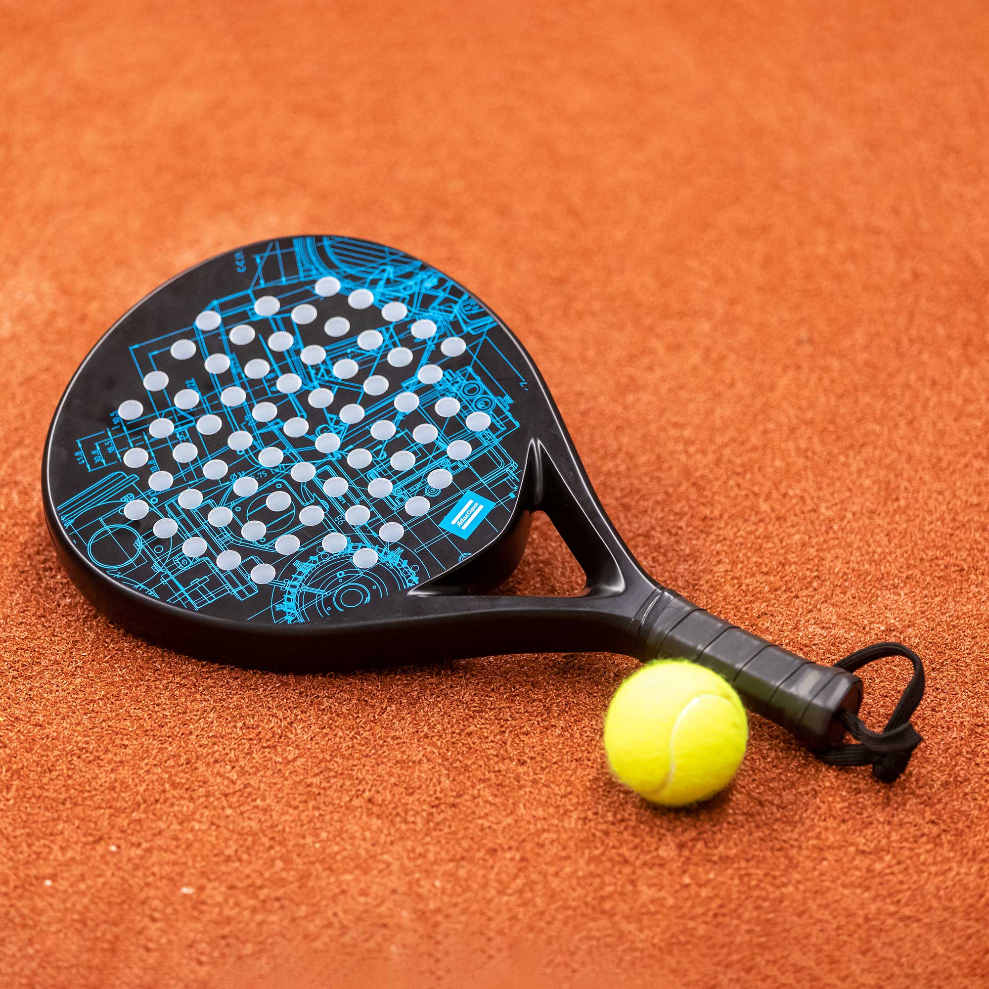 black padel racket with blueprint pattern