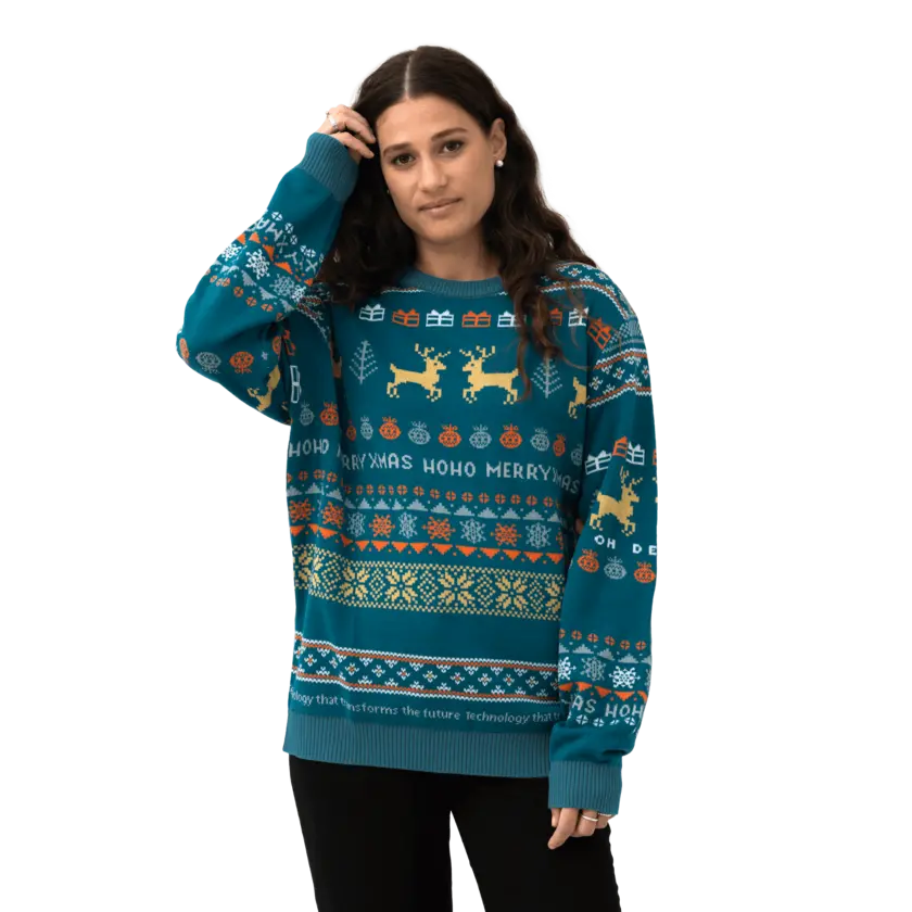 christmas sweater on female model with atlas copco group colors